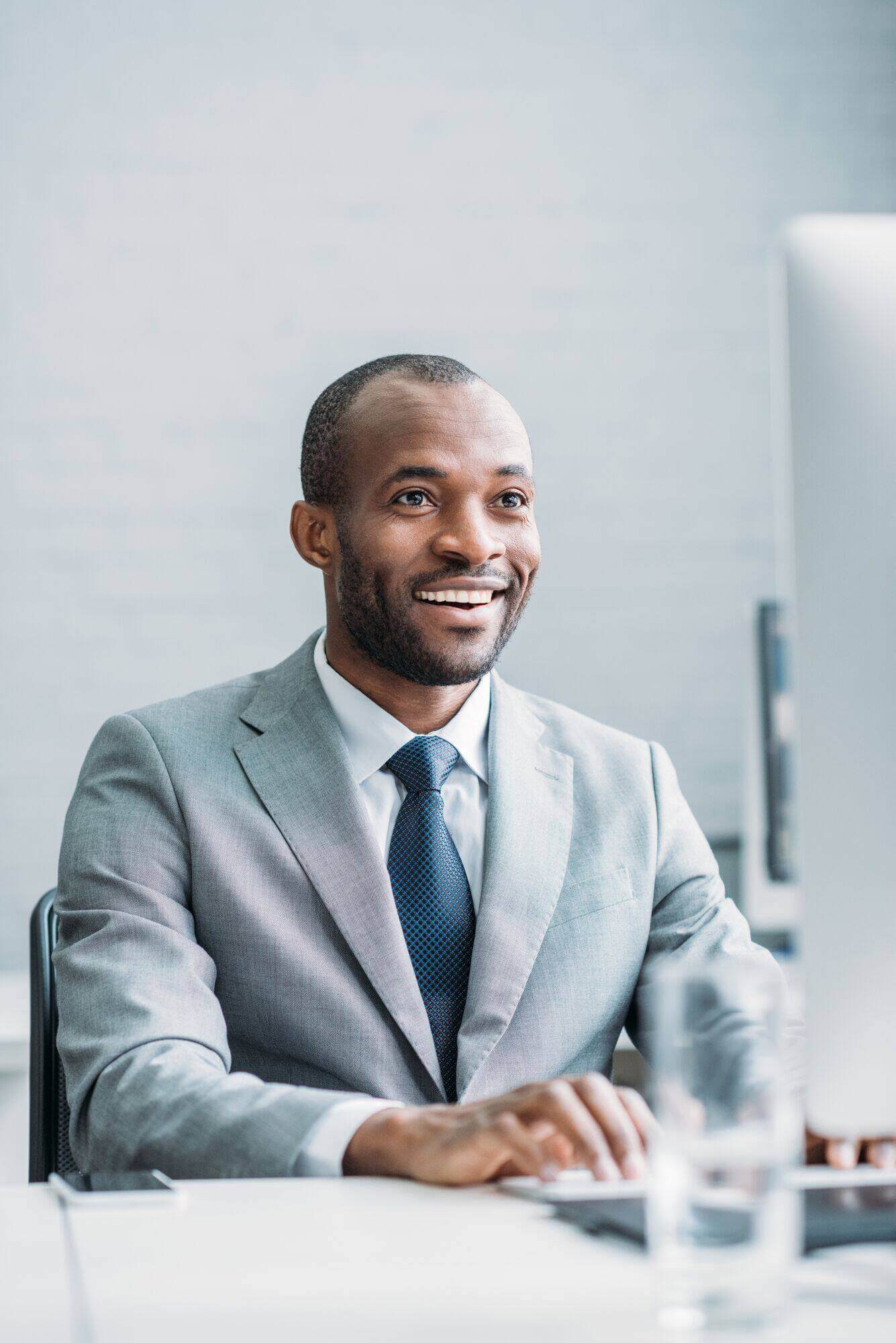 portrait-of-smiling-african-american-businessman-w-2024-11-18-10-23-22-utc.jpg